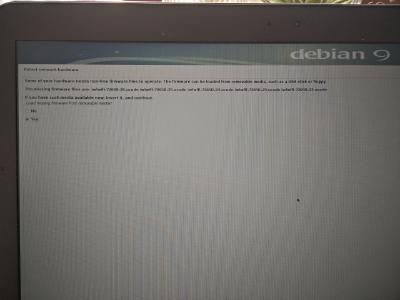 Photo of Debian installation screen prompting for non-free iwlwifi drivers being needed