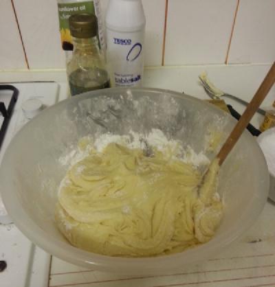Photo of mixing bowl half full with a mixture of golden syrup and butter