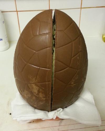 Photo of giant creme egg with split from top to bottom