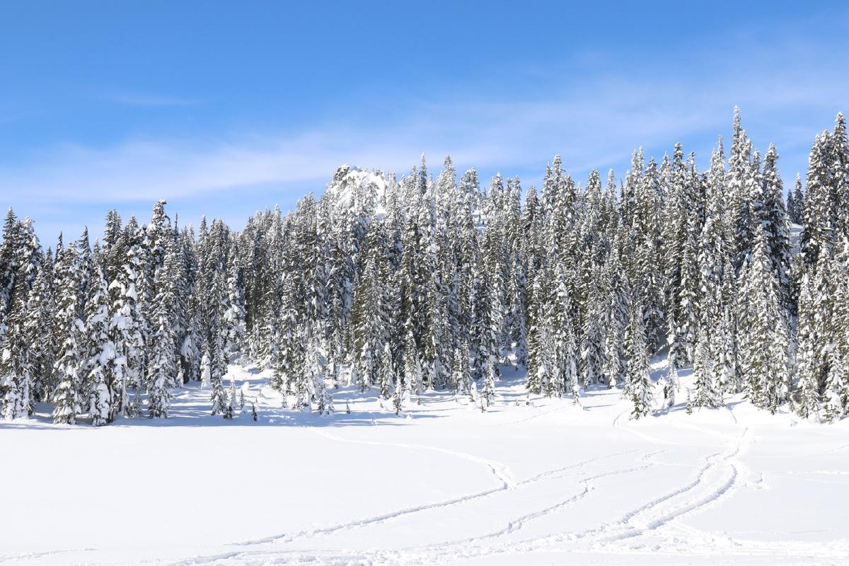 A clear view across Skyline Lake towards Heather Ridge.