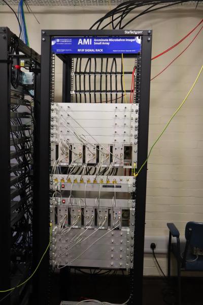 A server rack with a dozen or so rows of rack mounted RF equipment.