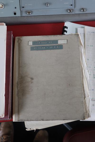 An old grey log book.