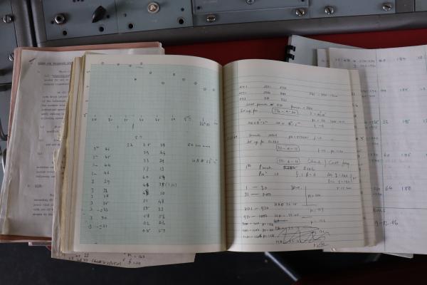 A page with scribbled numbers and calculations.