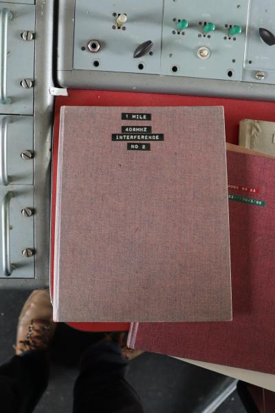 An old red log book.
