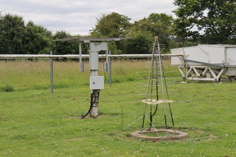 The SKALA-2 antenna with one of the COAST white boxes behind.