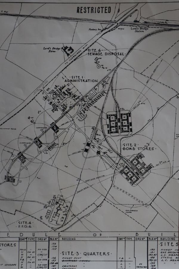 An old black & white map, which displays the locations of railway lines, buildings and roads at Lord's Bridge.