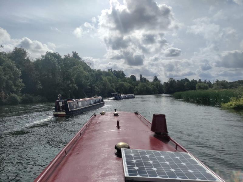 Two boats going past us.