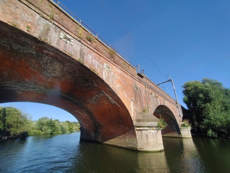 Arched brick railway bridge.