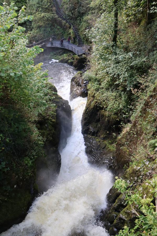 Looking down at cascading white water.
