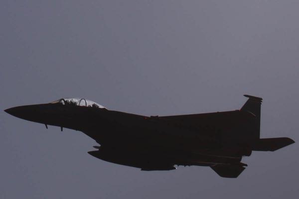 Looking sideways at a fighter jet.