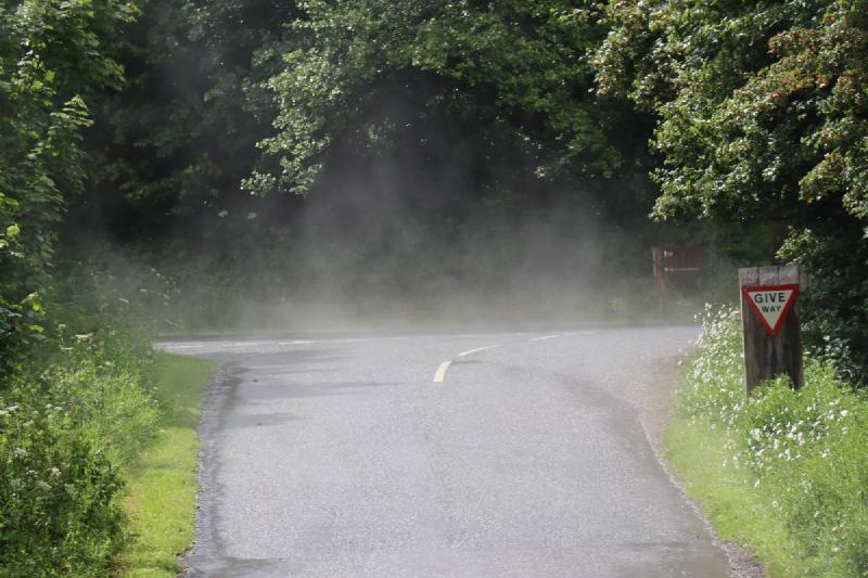 Thick mist over the road.